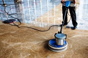62847010 - people polishes floor indoors